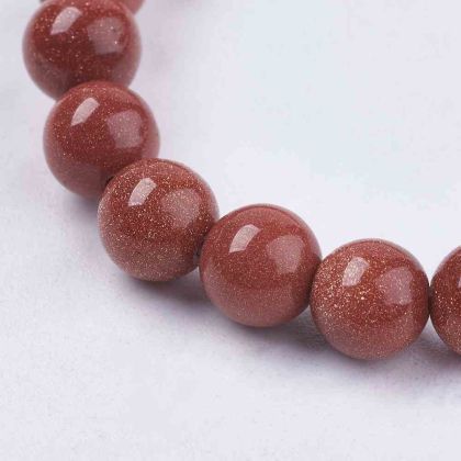 Наниз от блестящи мъниста златен пясъчен камък Goldstone с размер 6мм.